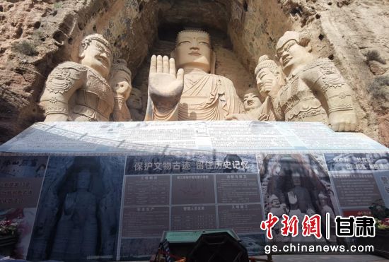 時下，中國“石窟鼻祖”天梯山石窟第13窟大佛足部與局部危巖體搶救性保護項目正在施工。圖為施工現(xiàn)場。陳曉斌 攝